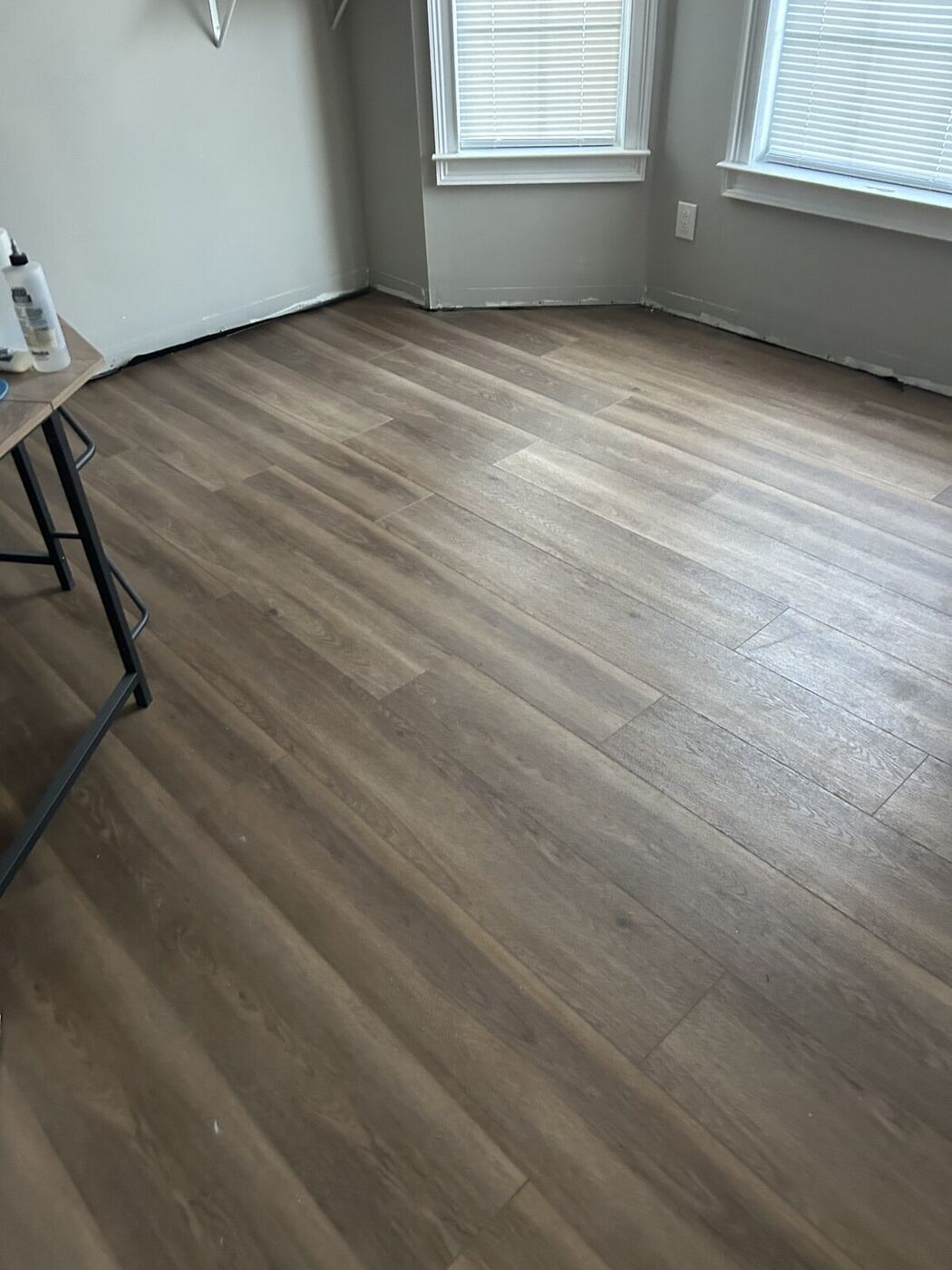 Finished flooring in a dried and rebuilt living room