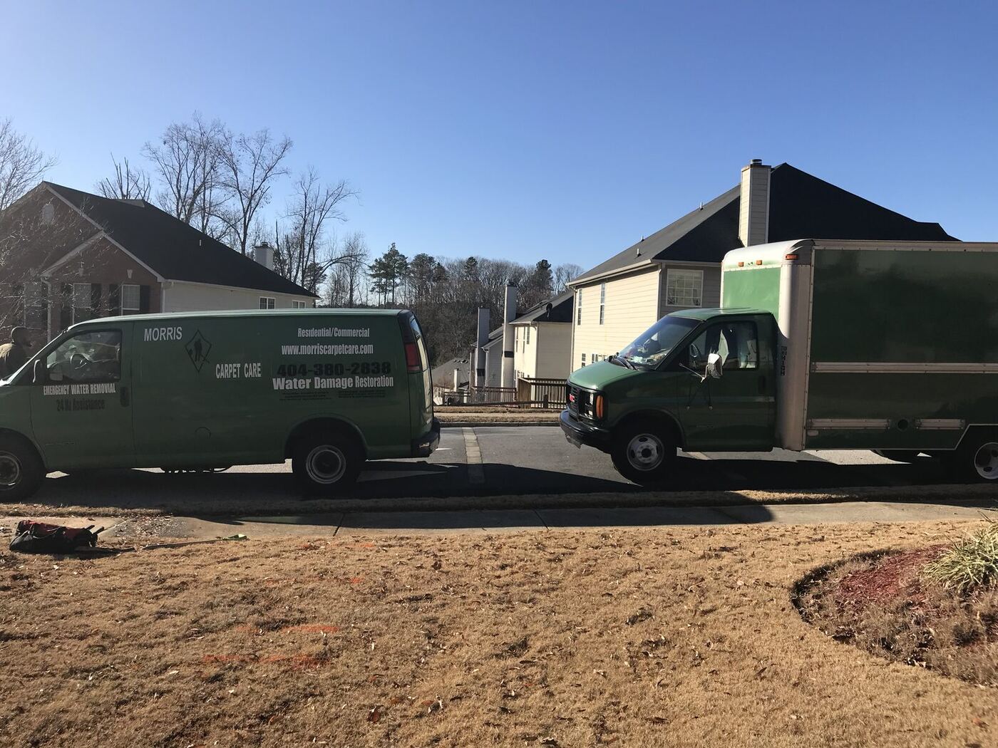Morris Plumbing water damage restoration truck parked on a residential street